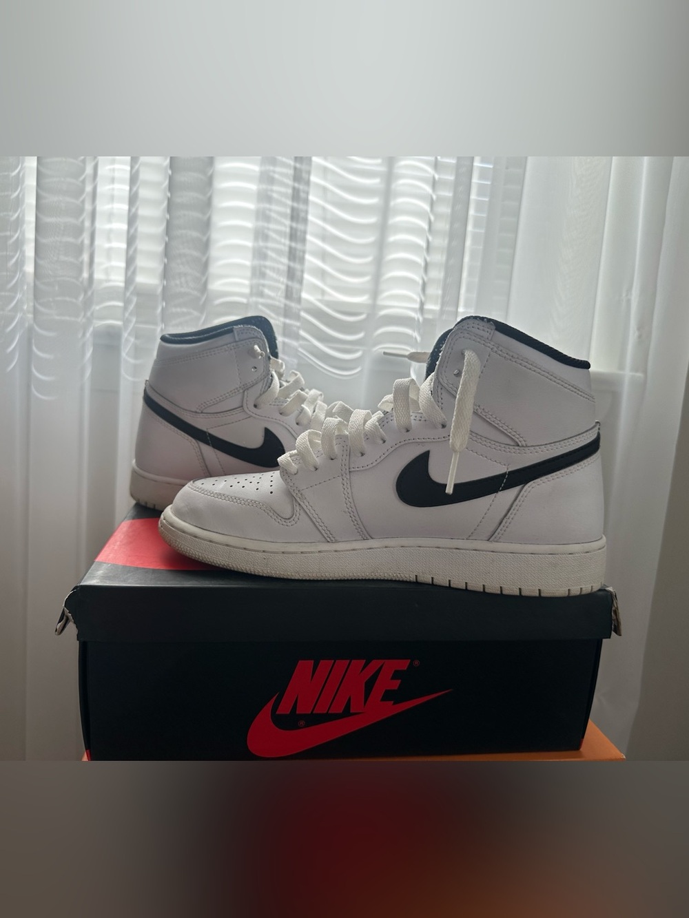 Jordan 1 Yin Yang Nike Men’s White High-Top Sneakers with Black Swoosh